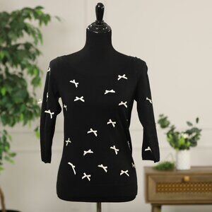Knitted and Knotted Black Sweater with White Bows